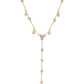14kt gold single row diamond bezel drip lariat necklace