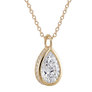 14kt gold teardrop diamond side halo bezel necklace