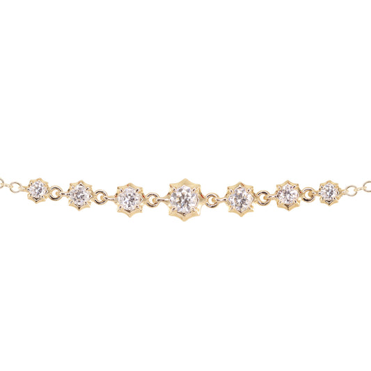 14kt gold round diamond star bracelet