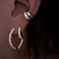 14kt gold diamond and pink sapphire grande encrusted hoop