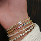 14kt gold rainbow sapphire heart bezel tennis bracelet