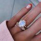 14kt gold and diamond solitaire moonstone ring with halo