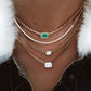 14kt gold illusion emerald cut diamond necklace on flat link chain