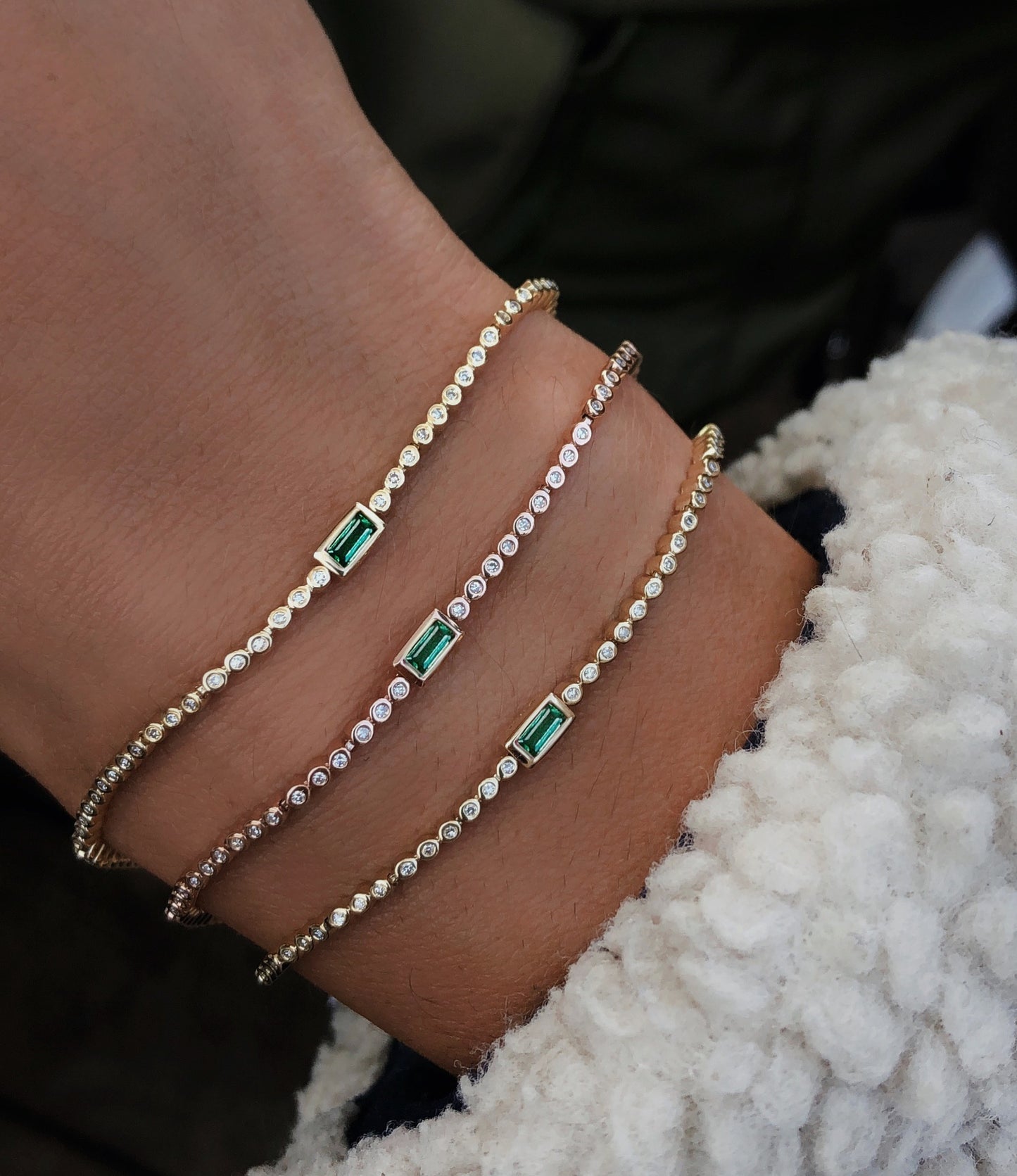 14kt gold and diamond bezel emerald baguette bracelet