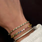 14kt gold rainbow sapphire heart bezel tennis bracelet