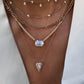 14kt gold illusion emerald cut diamond necklace on flat link chain