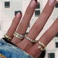 14kt gold mixed diamond cut coil ring