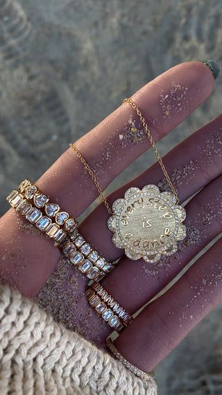 14kt gold and diamond flower disk every step necklace