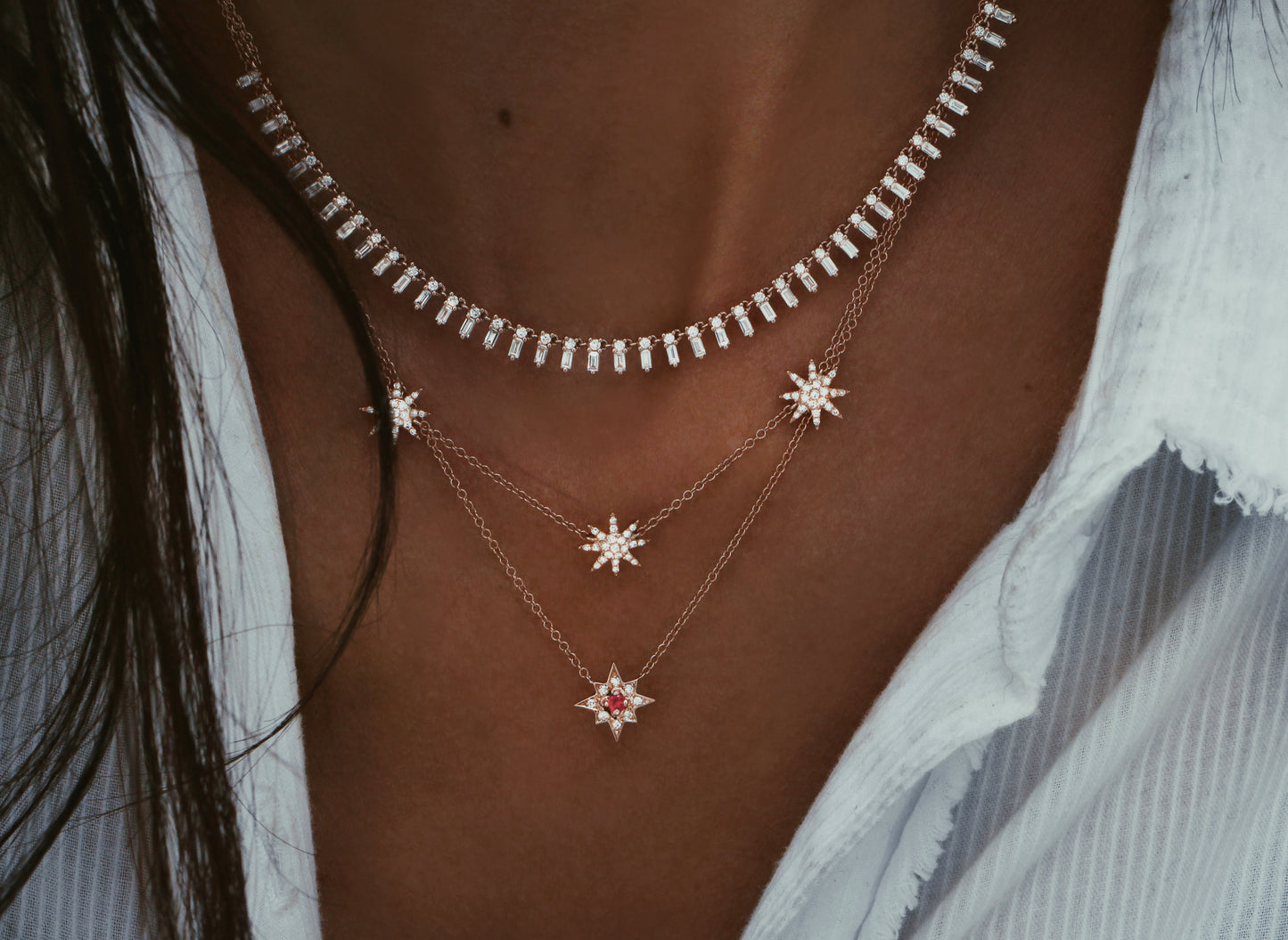 14kt gold ruby starburst necklace