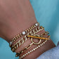 14kt gold baguette orange sapphire toggle thick paperclip bracelet