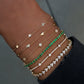 14kt gold and diamond round bezel section bracelet