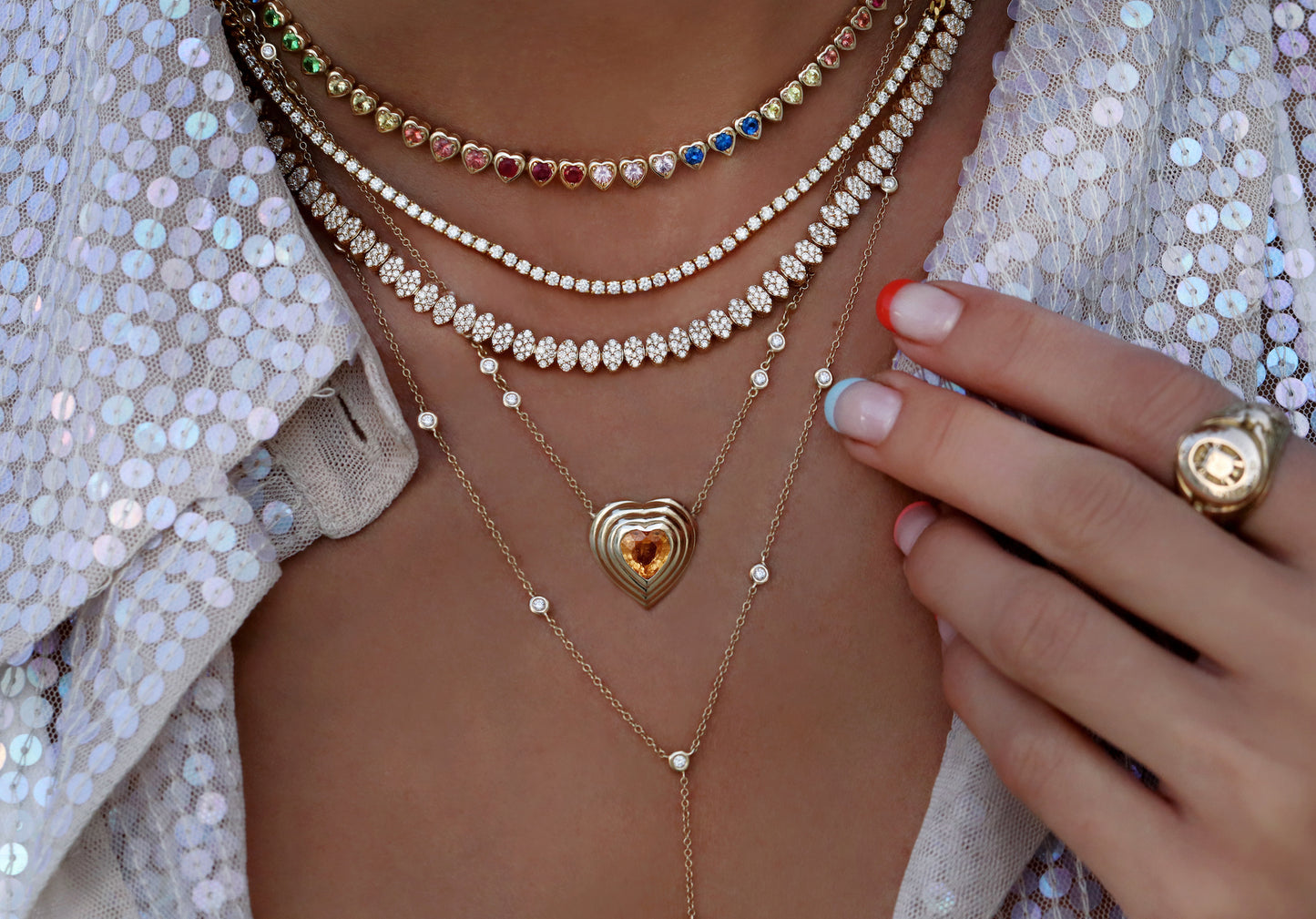 14kt yellow gold rainbow sapphire heart bezel tennis necklace