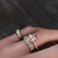14kt gold emerald cut diamond bezel band