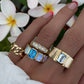 14kt gold emerald cut moonstone and blue topaz ring