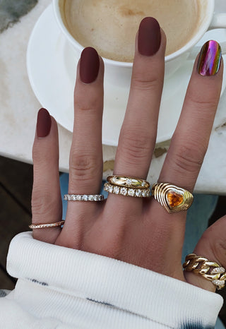 14kt gold and spaced white diamond ring