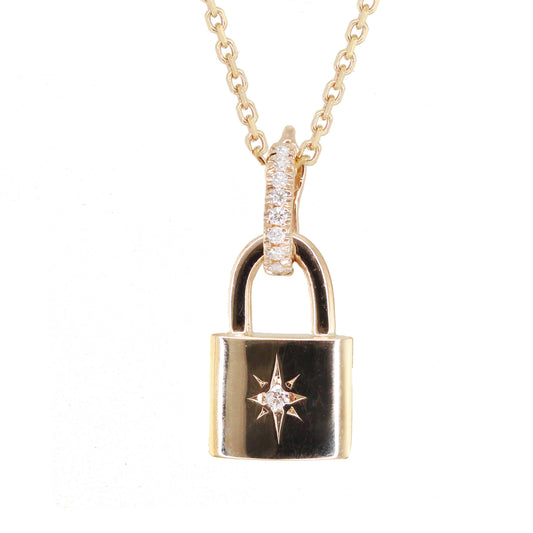 14kt gold and diamond starburst lock necklace