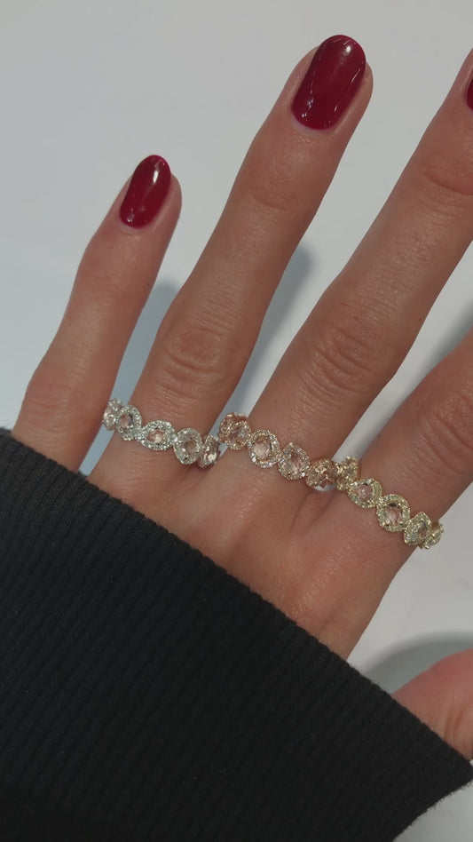 14kt gold and diamond teardrop cluster band