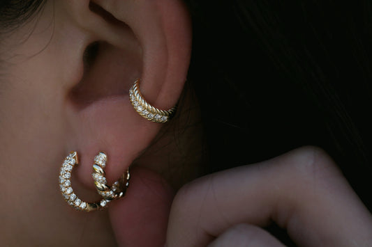 twisted gold diamond earrings