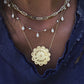 14kt gold and diamond flower disk every step necklace