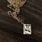 14kt gold and diamond starburst vintage book charm
