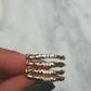 14kt gold and diamond skeleton hand ring - Luna Skye